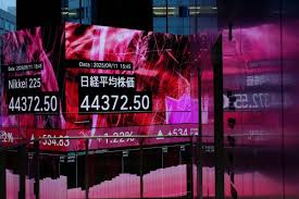 Asian Markets Mixed Ahead of Expected US Federal Rate Cut